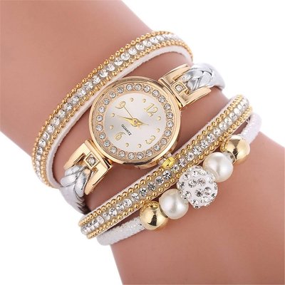 Розкішний золотий шкіряний годинник для жінок з браслетом. 2253 фото
